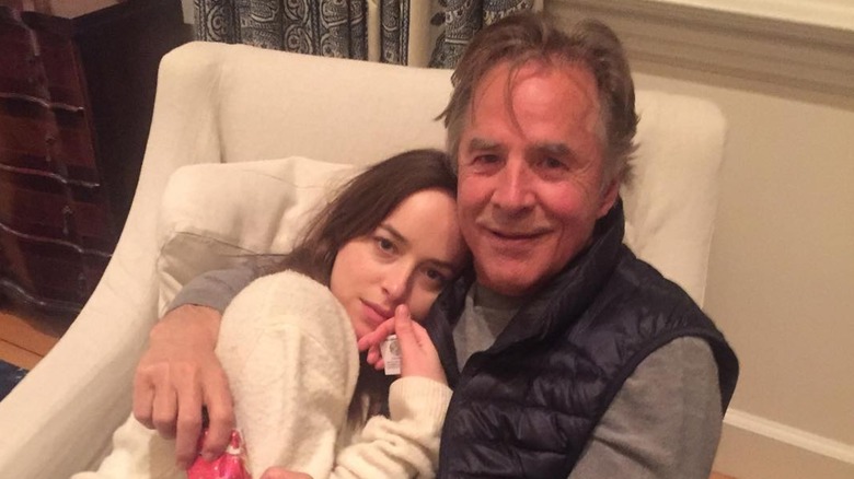 Dakota Johnson cuddling up to her dad Don Johnson