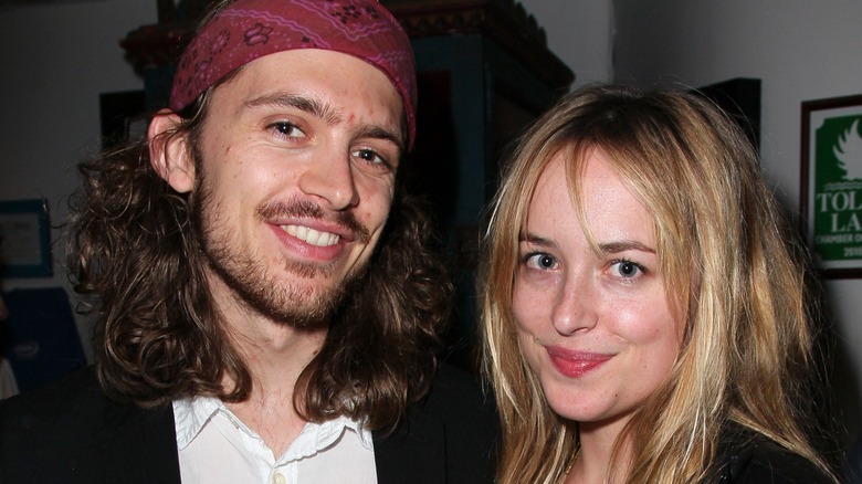 Alexander Bauer smiling with Dakota Johnson