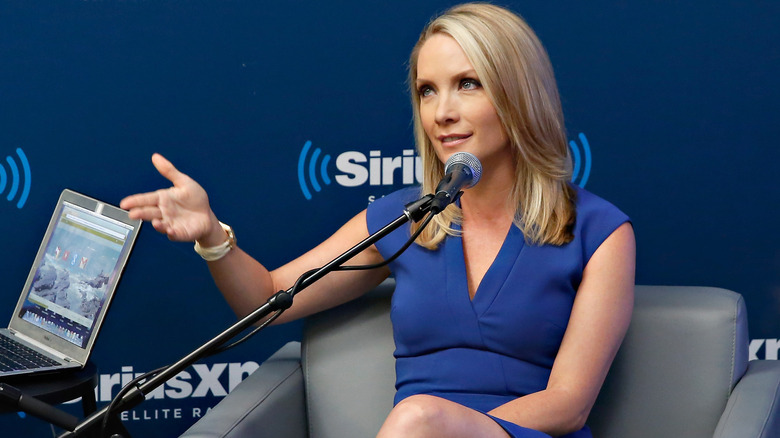 Dana Perino speaking to someone