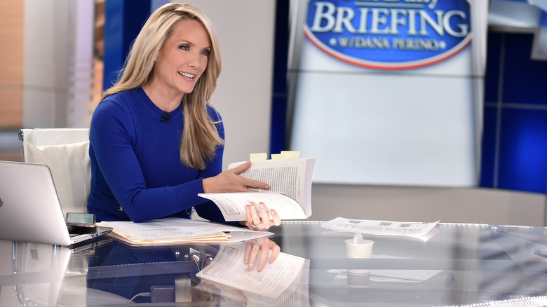 Dana Perino speaking to someone