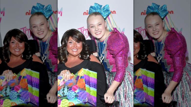 Abby Lee Miller and JoJo Siwa smiling