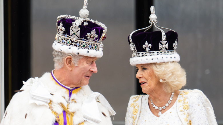 Camilla, queen consort, and King Charles III talking 