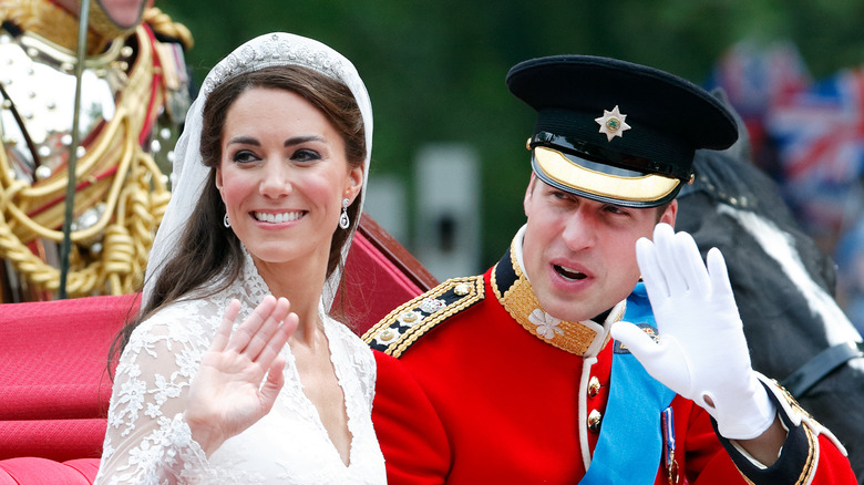 Kate Middleton and Prince William wave from carriage