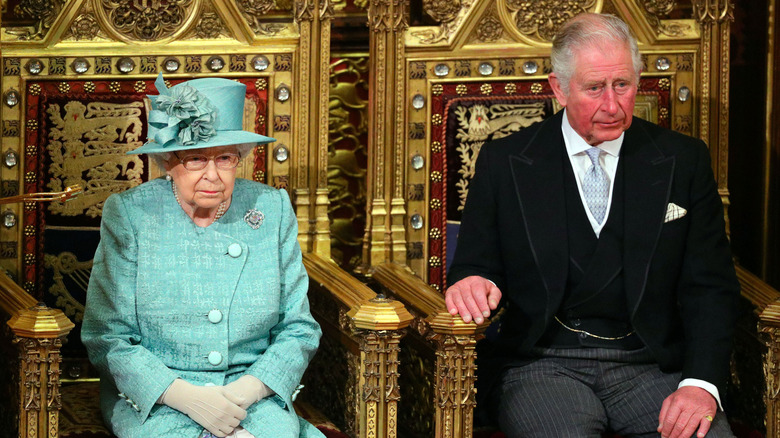 Charles and Elizabeth on the throne, seated