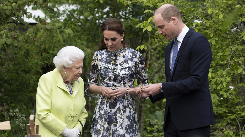 Queen Elizabeth at an event with Prince William and Kate Middleton