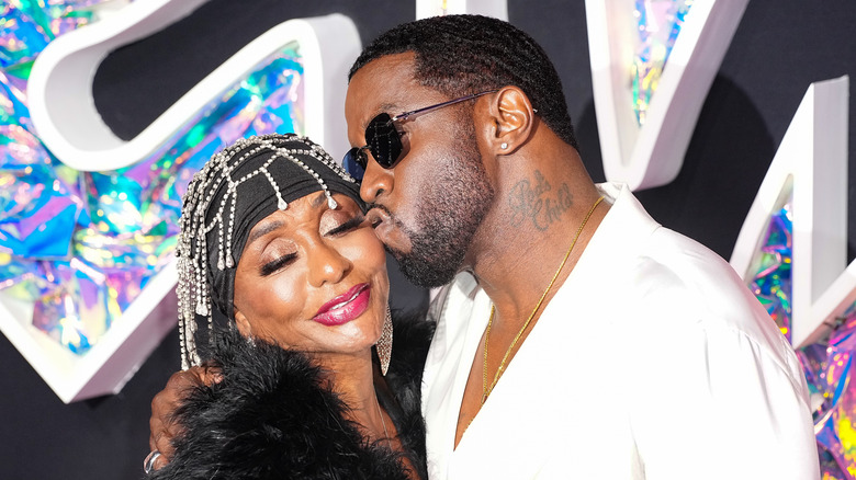 Sean 'Diddy' Combs kisses his mother on the cheek