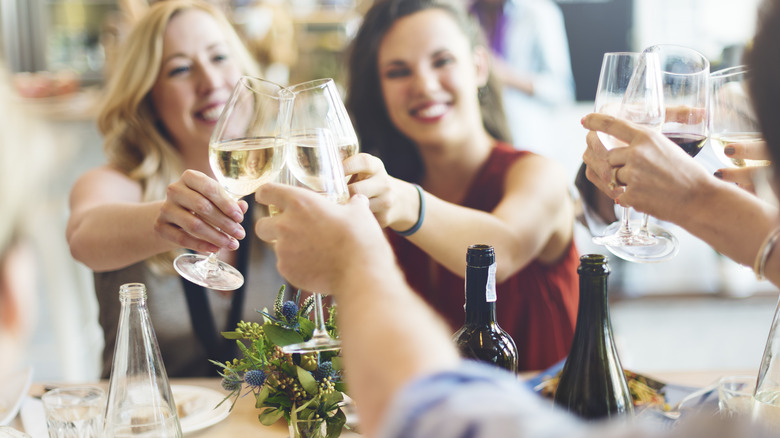 Women drinking white wine