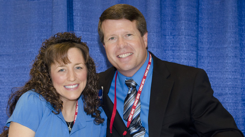 Michelle and Jim Bob Duggar pose together at an event