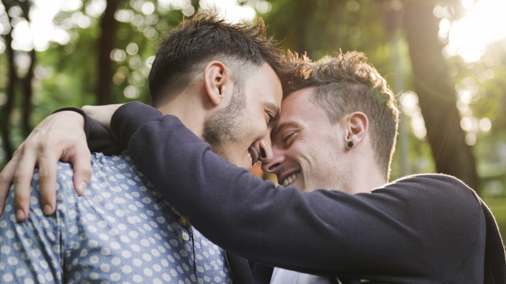 Couple holding each other and smiling