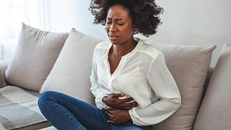 Woman having stomach pain