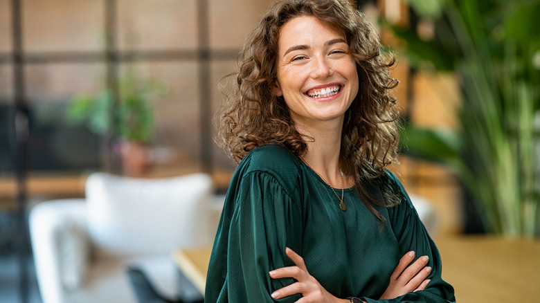 Confident woman smiling 