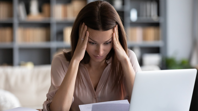 Woman struggling to concentrate 