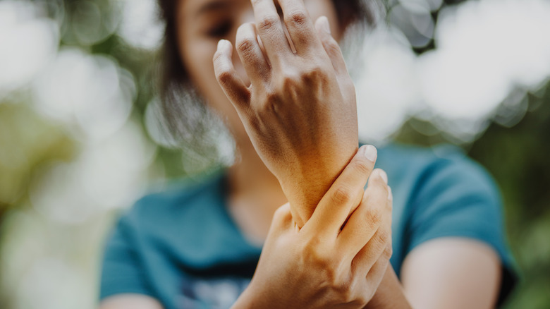 Woman in pain with wrist 