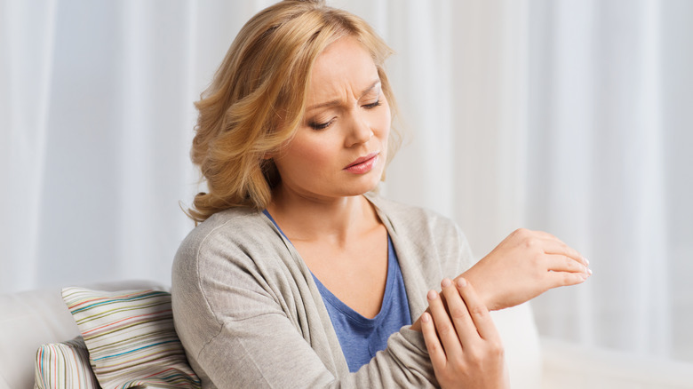 Woman having pain in her wrist 