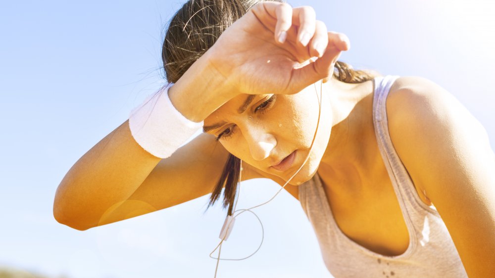 Woman sweating a lot 