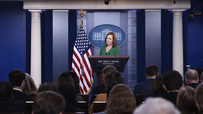 Jen Psaki in a green dress