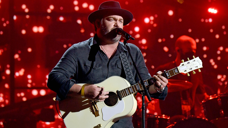 Lee Brice performing on stage