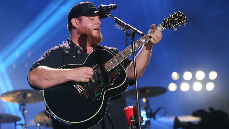 Luke Combs performing at an event