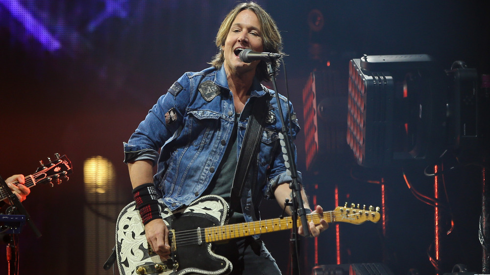 Keith Urban performing on stage