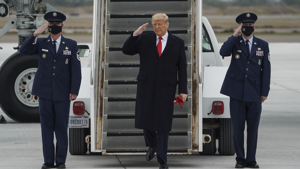 Trump descending Air Force One