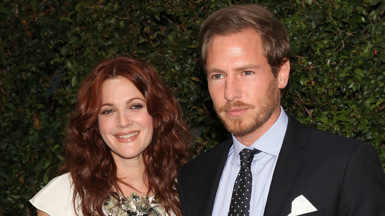 Drew Barrymore and Will Kopelman at an event