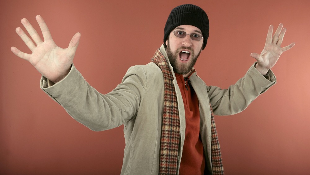 Dustin Diamond posing in beanie