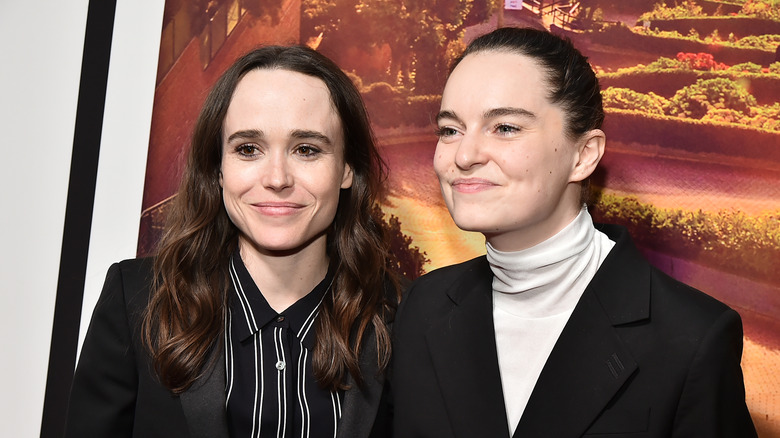 Elliot Page and Emma Portner smiling