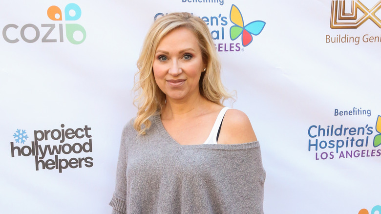 Leigh-Allyn Baker in a gray top