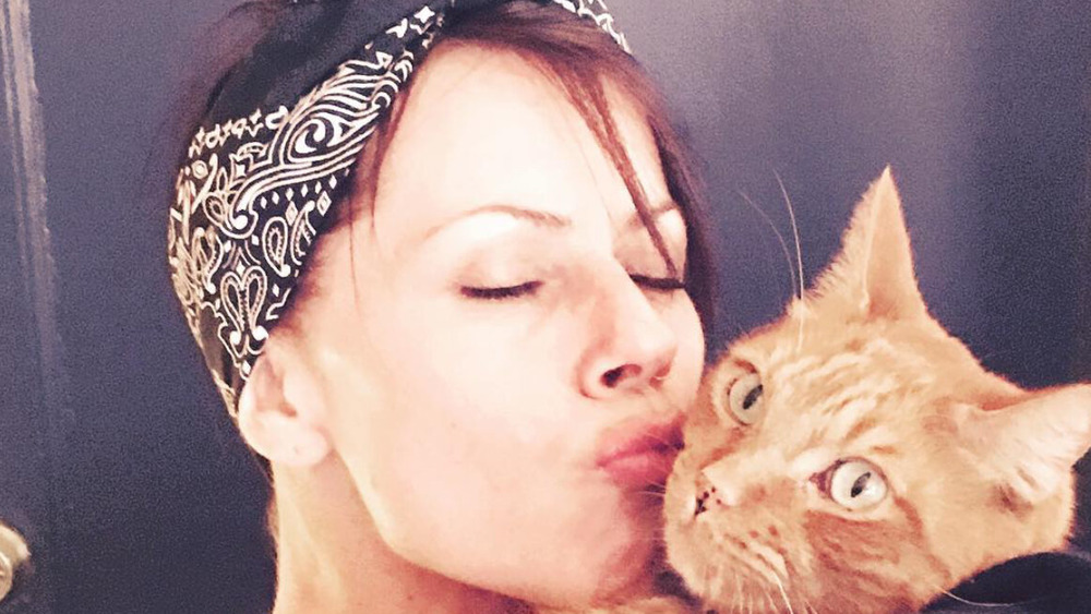 Fairuza Balk smooching her cat