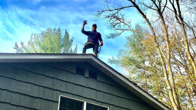 Joe Mazza working on a roof