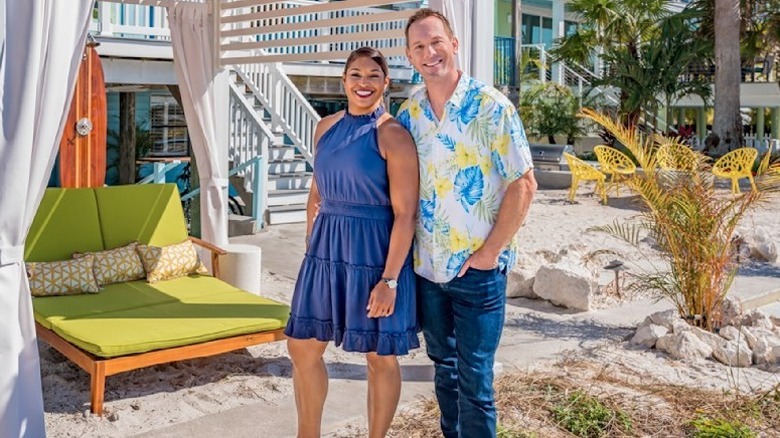 Mika and Brian Kleinschmidt posing on beach