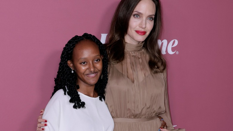 Zahara Jolie-Pitt poses with Angelina Jolie