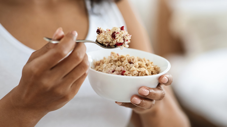 woman eating oatmeal