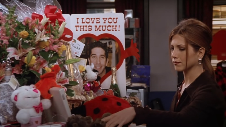 Rachel with flowers and gifts in "Friends"