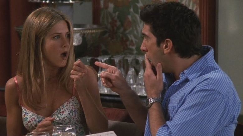 Ross and Rachel pointing in "Friends"
