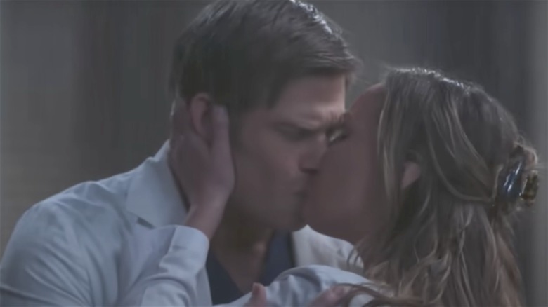 Chris Carmack as Link and Camilla Luddington as Jo kissing