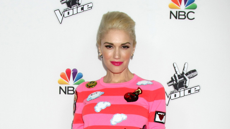 Gwen Stefani wearing pink sweater