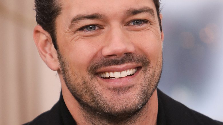 Ryan Paevey smiling