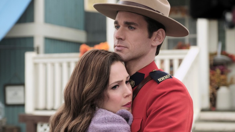 Erin Krakow and Kevin McGarry embracing in "When Calls the Heart"