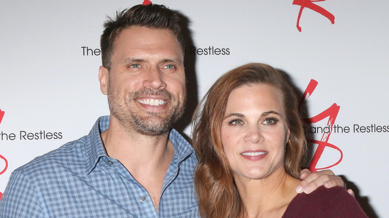 Joshua Morrow and Gina Tognoni smiling