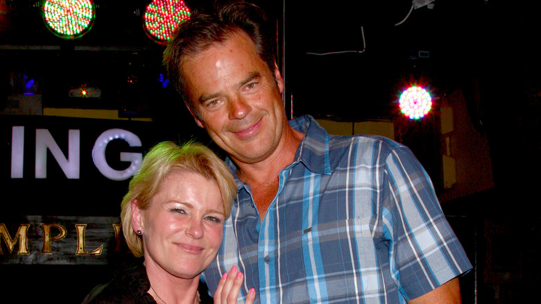 Judi Evans and co-star Wally Kurth pose for a photo together. 