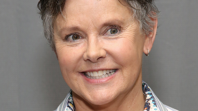 Amanda Bearse smiling at press event 