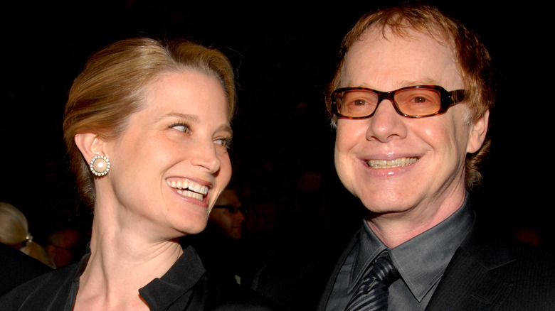 Bridget Fonda smilng at Dann Elfman