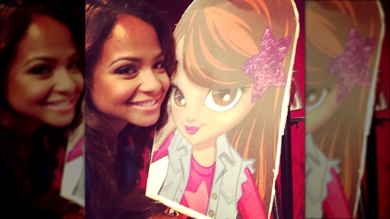 Christina Milian posing with Shelby Star