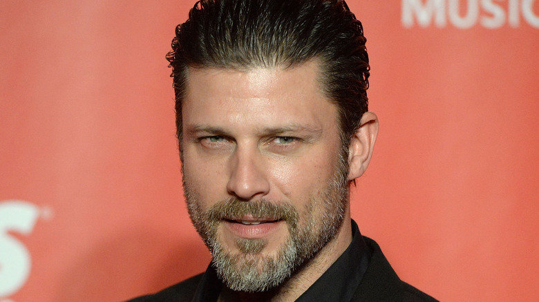 Greg Vaughan poses for a photo