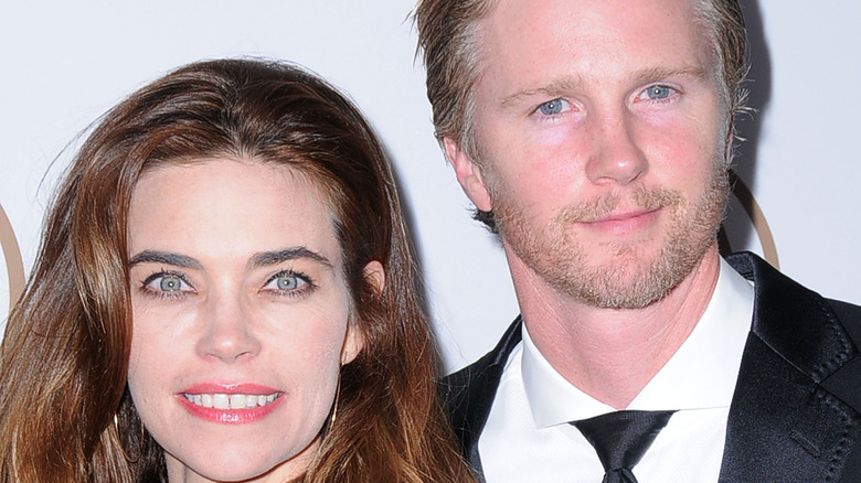 Amelia Heinle and Thad Luckinbill posing