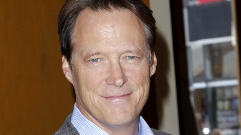 Matthew Ashford poses at an event. 