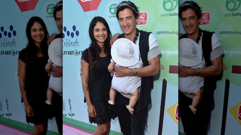 Andrew Keegan poses with his daughter and partner