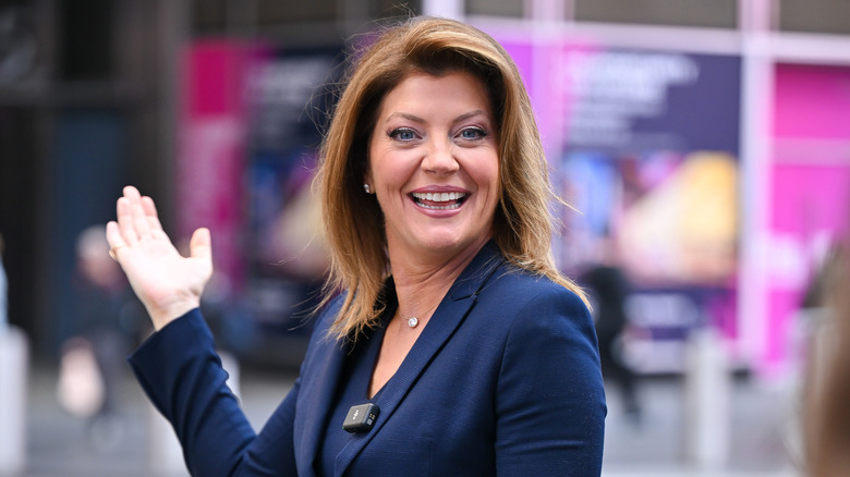 Norah O'Donnell posing in Times Square in 2024