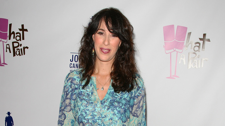 Maggie Wheeler posing